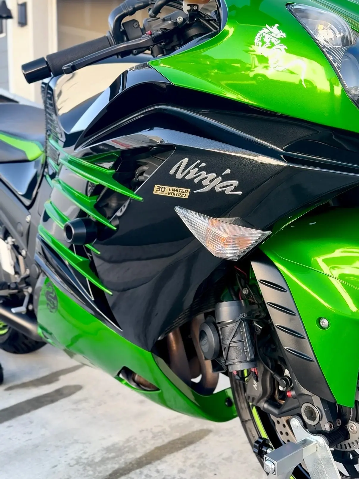 The green fairing of a Kawasaki Ninja ZX-14, freshly detailed