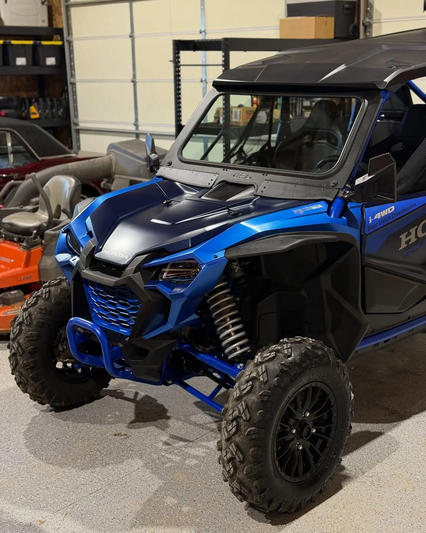 A blue Honda Talon side-by-side after detailing